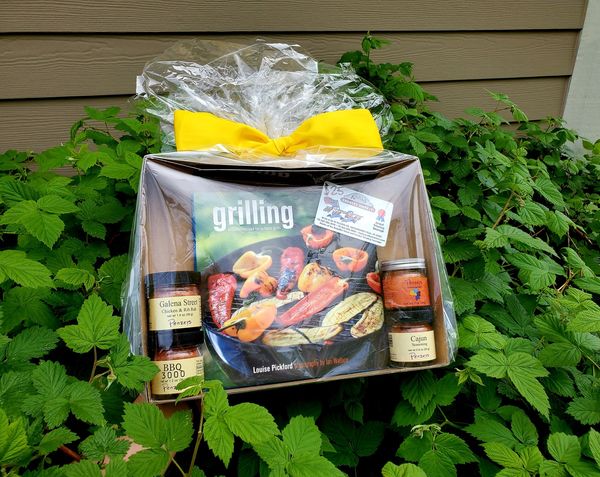 Grilling Prize Pack: Includes 4-pack of Penzeys spices (Galena Street Chicken & Rib Rub, Seasoned Salt, Cajun Seasoning, and BBQ 3000), Grilling by Louise Pickford, and a $25 gift card to Karl's Country Market to stock up on meat for the grill.
